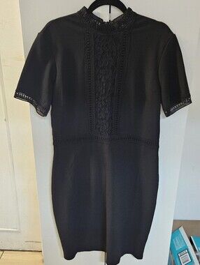 Mock-Neck Black Mini Dress with Lace Panel